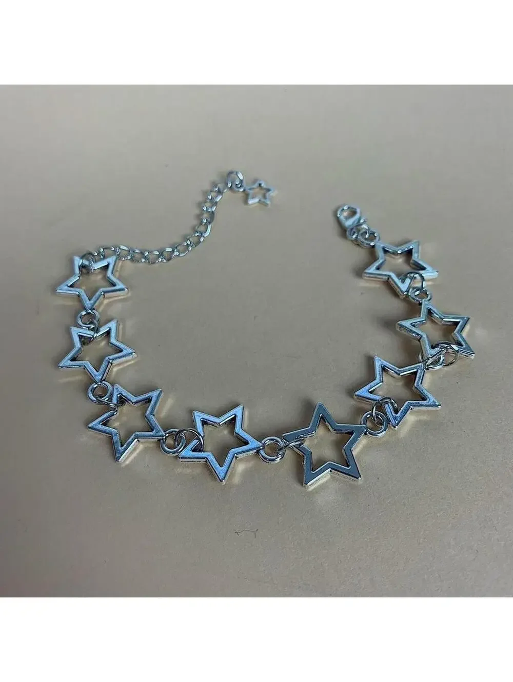 Y2k style silver star bracelet. Adjustable. Cool design. Nice quality and